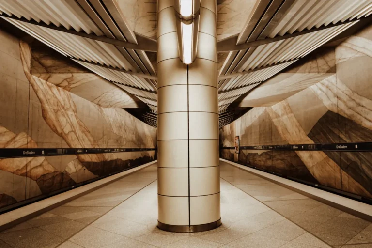 Government proposes £100 loud music bus fine in antisocial crackdown Explore the sleek design of a modern subway station with geometric patterns and ambient lighting